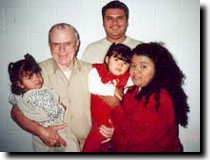 Loren Pogue with his family during prison visitation